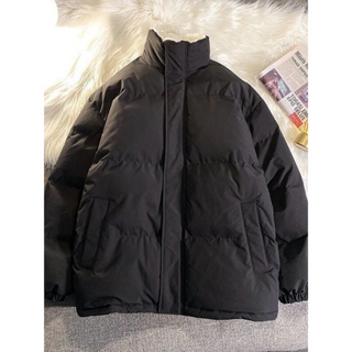 A stylish men's puffer jacket featuring a mock neck design, crafted from warm, insulated material to keep you cozy during winter outings. Its contemporary style combines 2
