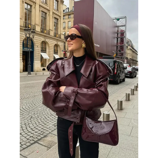 This women's cropped jacket features an oversized design, crafted from high-quality fabric for comfort and durability. Its stylish and versatile look makes it perfect for layering over 0